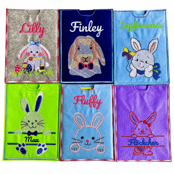 Produktübersicht von Impfausweishülle aus Filz für Kaninchen mit verschiedenen Kaninchen-Stickdesigns
