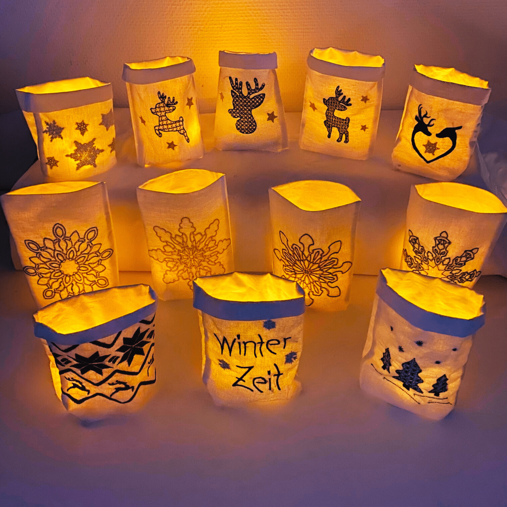 Produktvorschau von Lichtbeuteln mit Winter-Motiven in verschiedenen Designs