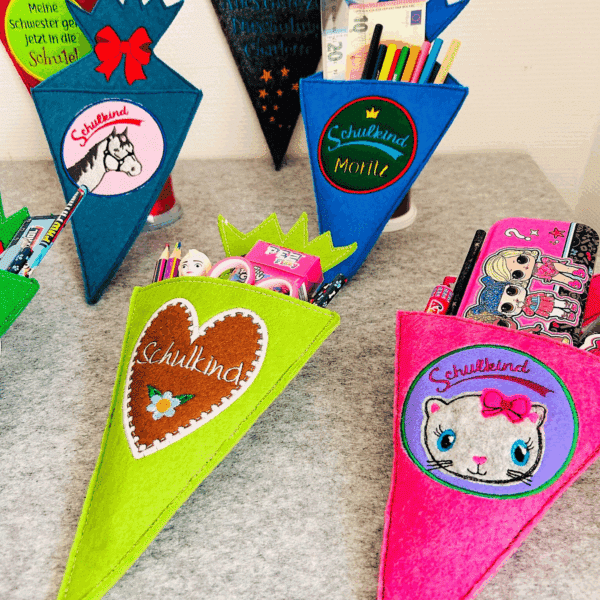 Personalisierte Schultüte aus Filz für Mädchen und Jungen mit verschiedenen Motiven und Füllungen.